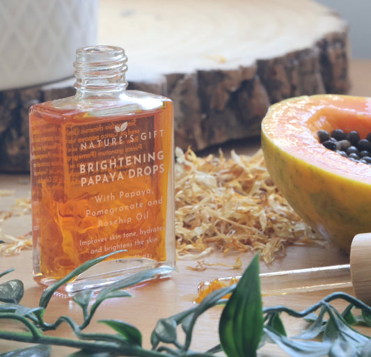 What are the benefits of using papaya oil for the skin?